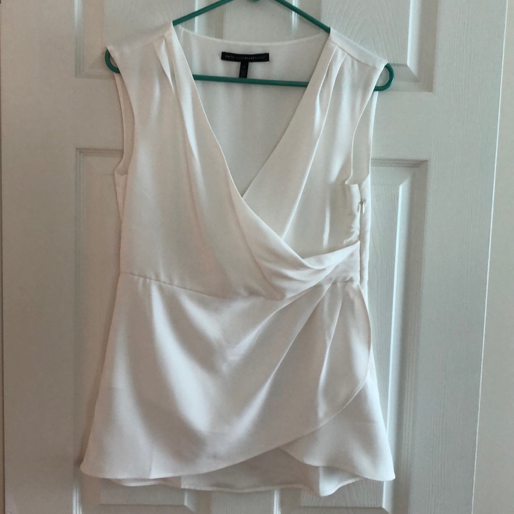White House Black Market sleeveless blouse. Never worn.